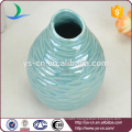 YSv0067-04 Embossed porcelain mini vase with pearlized finishing